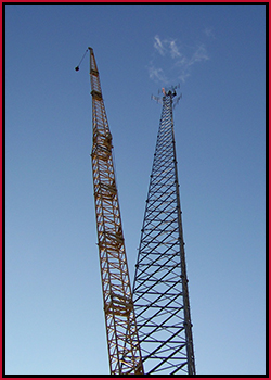 Crane putting up tower